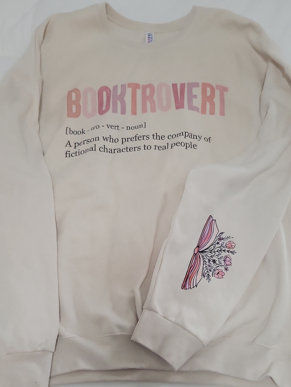 Jerzees Booktrovert Cream Sweatshirt with Pink Graphic